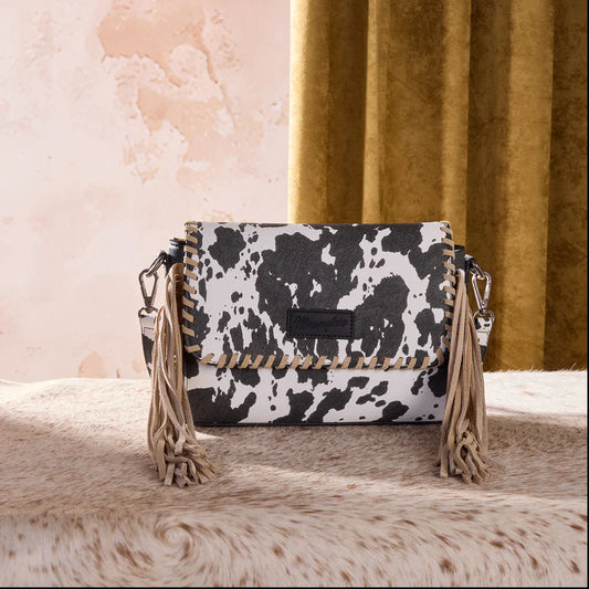 WRANGLER COW PRINT FRINGE CROSSBODY BAG